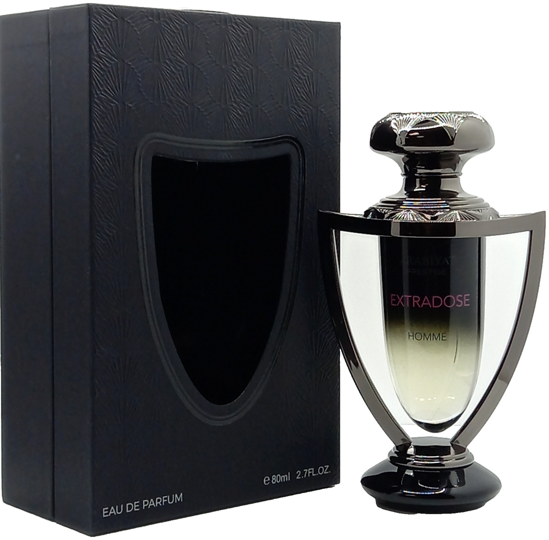 Arabiyat Prestige Extradose Homme Eau de Parfum bottle displayed next to its black retail packaging.&nbsp;
