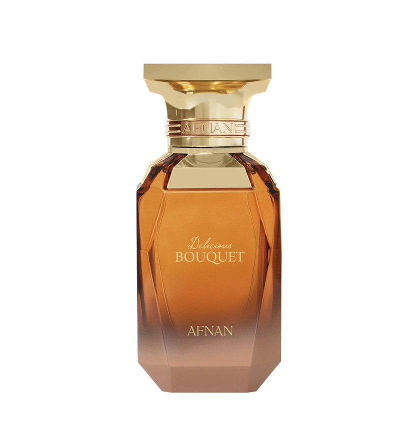 Afnan Delicious Bouquet amber perfume bottle fading to smoky brown at the base, with faceted sides, gold shoulders, broad gold cap and gold lettering on white.