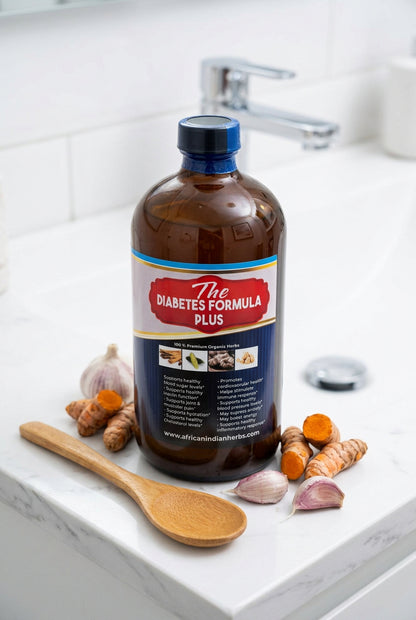 African Indian Herbs The Diabetes Formula Plus bottle on a white counter with roots and botanical props