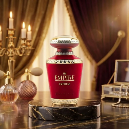 Khadlaj Empire Empress red bottle on a gold and black vanity with burgundy curtains