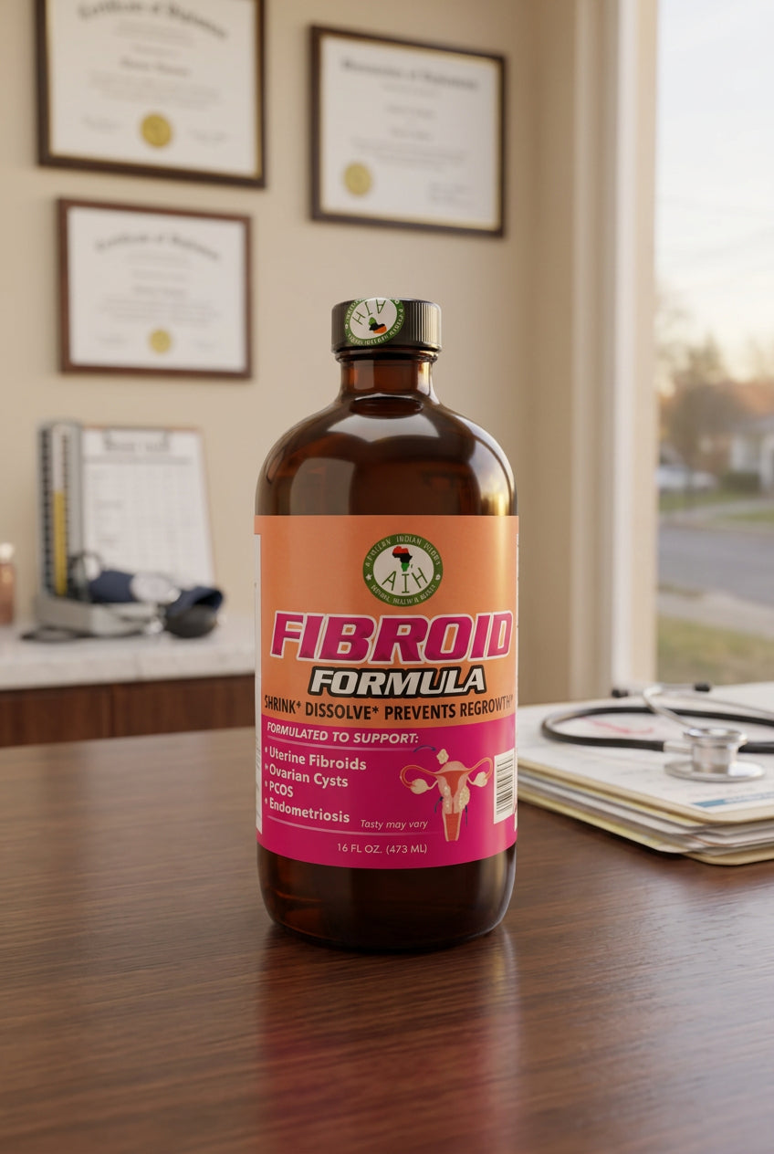 African Indian Herbs Fibroid Formula bottle on a desk in an office setting