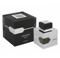 Al Haramain L'Aventure Intense silver square perfume bottle with an angular amber window and black cap beside a black box with silver detailing on white.