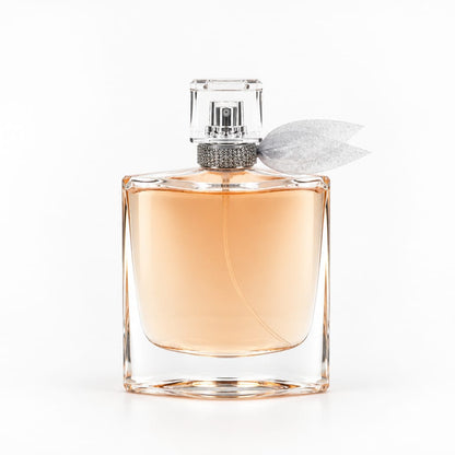 La Bella Viva V7 clear perfume bottle with silver cap and pale fabric detail