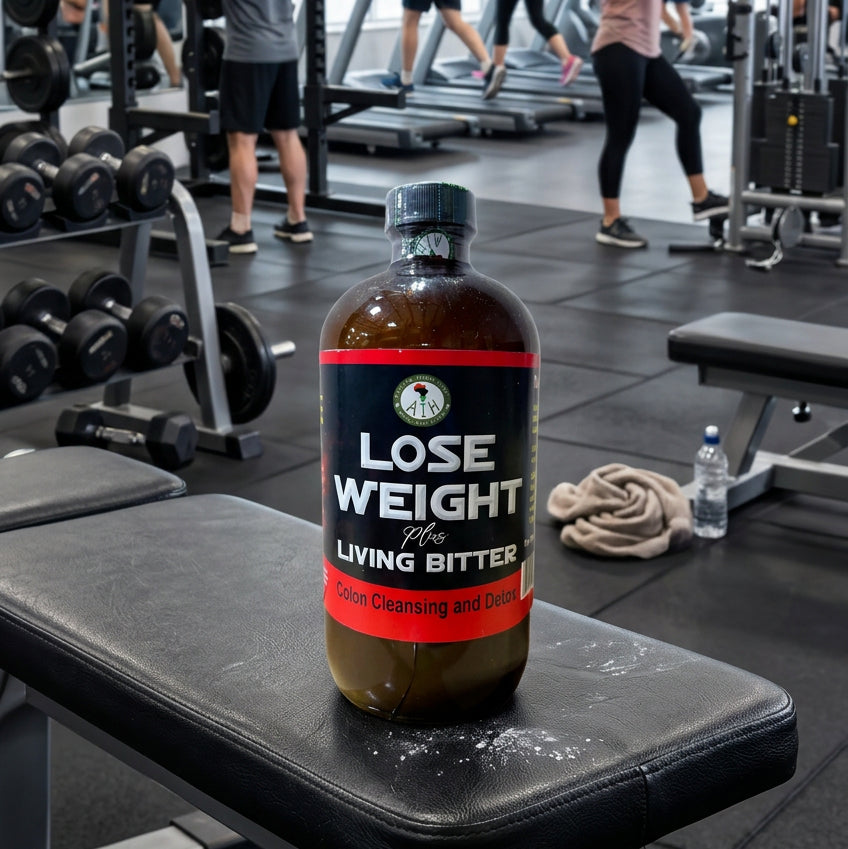 African Indian Herbs Lose Weight Plus Living Bitter bottle on a workout bench beside gym equipment