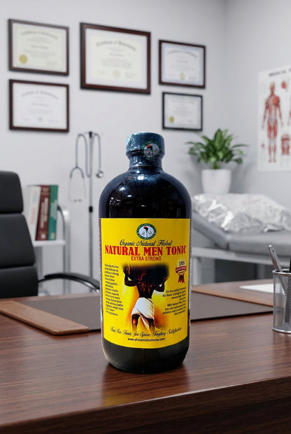 African Indian Herbs Natural Men Tonic Extra Strong bottle on a desk in an office setting