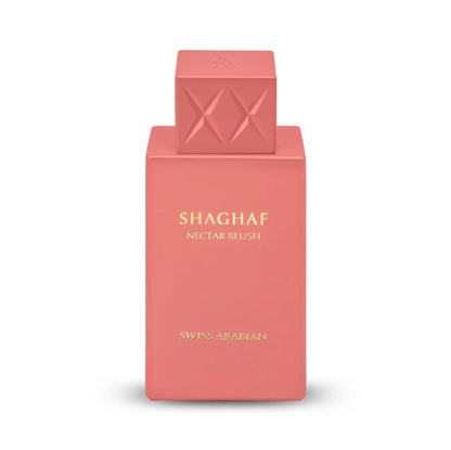 Swiss Arabian Shaghaf Nectar Blush coral-pink bottle with gold lettering and square cap embossed with two crossed diamond motifs, isolated on white.