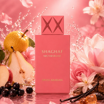 Swiss Arabian Shaghaf Nectar Blush pink bottle surrounded by pear, dark berries, pink flowers, dark pods and splashing water against a pink background.