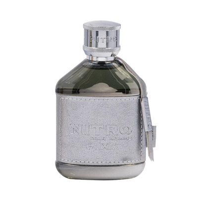 Dumont Paris Nitro Elixir bottle with dark translucent shoulders, stitched silver-gray front wrap, matching side tag and textured silver cap on white.