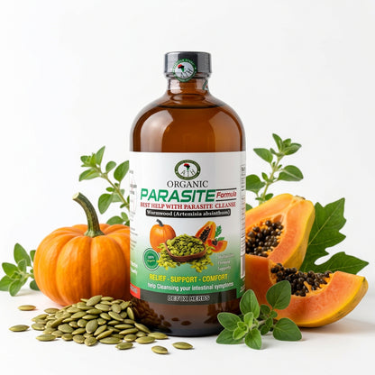 African Indian Herbs Parasite Formula bottle in a botanical arrangement with pumpkin and papaya props