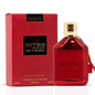 Dumont Paris Nitro Red Intensely perfume in a glossy red bottle with a gold cylindrical cap and red side tag, beside its red box with black-and-gold labels on white.