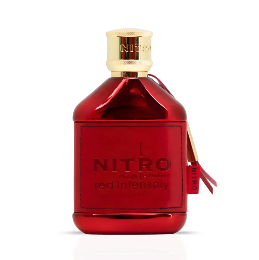 Dumont Paris Nitro Red Intensely red perfume bottle with embossed front lettering, gold textured cap and hanging red Nitro tag, isolated on white.